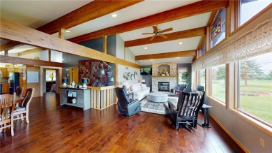 Nestled along the rolling greens of the golf course, this on Green Lea Golf Course in Minnesota - for sale on GolfHomes.com, golf home, golf lot
