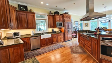 Discover the epitome of luxury living nestled in the North on McLemore Golf Club in Georgia - for sale on GolfHomes.com, golf home, golf lot