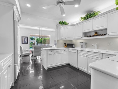 Spacious 3BR/2.5BA home in the prestigious Woodlands of Tamarac on Woodlands Country Club in Florida - for sale on GolfHomes.com, golf home, golf lot