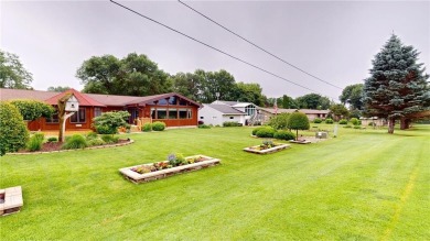 Nestled along the rolling greens of the golf course, this on Green Lea Golf Course in Minnesota - for sale on GolfHomes.com, golf home, golf lot