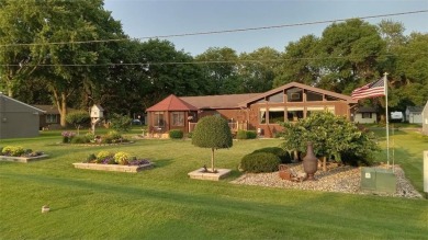 Nestled along the rolling greens of the golf course, this on Green Lea Golf Course in Minnesota - for sale on GolfHomes.com, golf home, golf lot