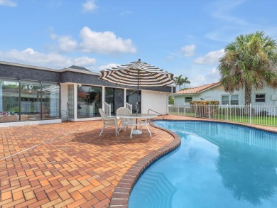 Spacious 3BR/2.5BA home in the prestigious Woodlands of Tamarac on Woodlands Country Club in Florida - for sale on GolfHomes.com, golf home, golf lot