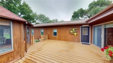 Nestled along the rolling greens of the golf course, this on Green Lea Golf Course in Minnesota - for sale on GolfHomes.com, golf home, golf lot