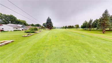 Nestled along the rolling greens of the golf course, this on Green Lea Golf Course in Minnesota - for sale on GolfHomes.com, golf home, golf lot