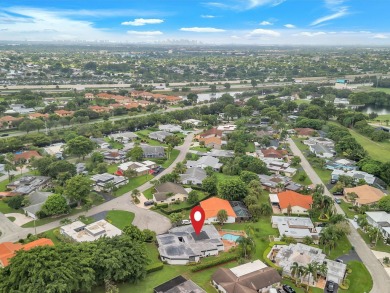 Spacious 3BR/2.5BA home in the prestigious Woodlands of Tamarac on Woodlands Country Club in Florida - for sale on GolfHomes.com, golf home, golf lot