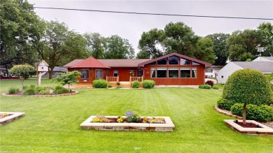 Nestled along the rolling greens of the golf course, this on Green Lea Golf Course in Minnesota - for sale on GolfHomes.com, golf home, golf lot
