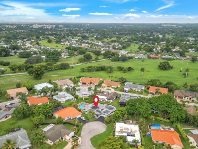 Spacious 3BR/2.5BA home in the prestigious Woodlands of Tamarac on Woodlands Country Club in Florida - for sale on GolfHomes.com, golf home, golf lot