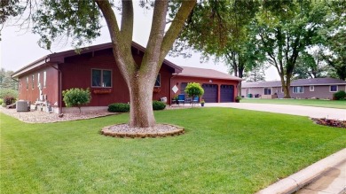 Nestled along the rolling greens of the golf course, this on Green Lea Golf Course in Minnesota - for sale on GolfHomes.com, golf home, golf lot