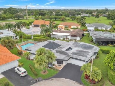 Spacious 3BR/2.5BA home in the prestigious Woodlands of Tamarac on Woodlands Country Club in Florida - for sale on GolfHomes.com, golf home, golf lot