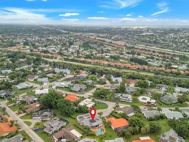 Spacious 3BR/2.5BA home in the prestigious Woodlands of Tamarac on Woodlands Country Club in Florida - for sale on GolfHomes.com, golf home, golf lot