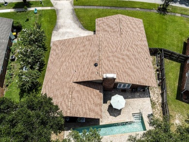 Step into this stunning, contemporary home crafted in 1972 on Fort Walton Beach Golf Course in Florida - for sale on GolfHomes.com, golf home, golf lot