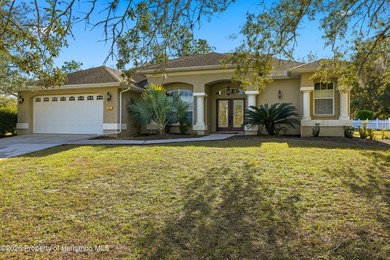Beautiful four bedrooms, two bath l home with large pool and on Sugarmill Woods Golf and Country Club in Florida - for sale on GolfHomes.com, golf home, golf lot