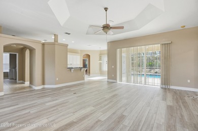 Beautiful four bedrooms, two bath l home with large pool and on Sugarmill Woods Golf and Country Club in Florida - for sale on GolfHomes.com, golf home, golf lot