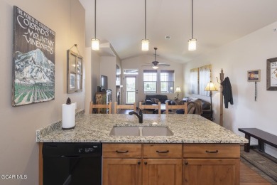 Experience the best of Aspen Meadows in this stunning 2-bedroom on Headwaters Golf Course At Granby Ranch in Colorado - for sale on GolfHomes.com, golf home, golf lot