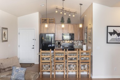 Experience the best of Aspen Meadows in this stunning 2-bedroom on Headwaters Golf Course At Granby Ranch in Colorado - for sale on GolfHomes.com, golf home, golf lot
