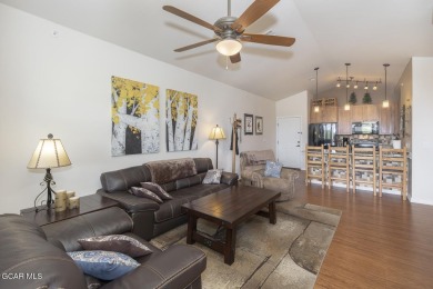 Experience the best of Aspen Meadows in this stunning 2-bedroom on Headwaters Golf Course At Granby Ranch in Colorado - for sale on GolfHomes.com, golf home, golf lot