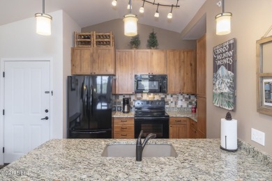 Experience the best of Aspen Meadows in this stunning 2-bedroom on Headwaters Golf Course At Granby Ranch in Colorado - for sale on GolfHomes.com, golf home, golf lot