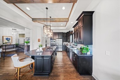 Experience elegance and maintenance-free living in this on Ironhorse Golf Club in Kansas - for sale on GolfHomes.com, golf home, golf lot