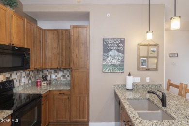 Experience the best of Aspen Meadows in this stunning 2-bedroom on Headwaters Golf Course At Granby Ranch in Colorado - for sale on GolfHomes.com, golf home, golf lot