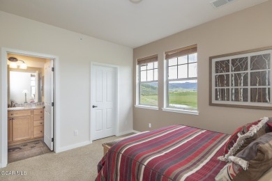 Experience the best of Aspen Meadows in this stunning 2-bedroom on Headwaters Golf Course At Granby Ranch in Colorado - for sale on GolfHomes.com, golf home, golf lot