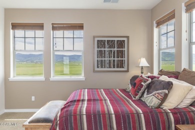 Experience the best of Aspen Meadows in this stunning 2-bedroom on Headwaters Golf Course At Granby Ranch in Colorado - for sale on GolfHomes.com, golf home, golf lot