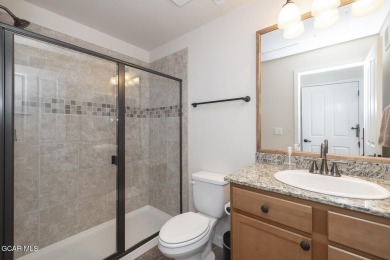 Experience the best of Aspen Meadows in this stunning 2-bedroom on Headwaters Golf Course At Granby Ranch in Colorado - for sale on GolfHomes.com, golf home, golf lot