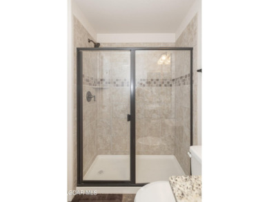 Experience the best of Aspen Meadows in this stunning 2-bedroom on Headwaters Golf Course At Granby Ranch in Colorado - for sale on GolfHomes.com, golf home, golf lot