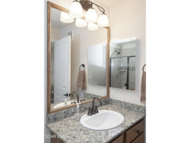 Experience the best of Aspen Meadows in this stunning 2-bedroom on Headwaters Golf Course At Granby Ranch in Colorado - for sale on GolfHomes.com, golf home, golf lot