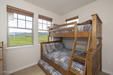 Experience the best of Aspen Meadows in this stunning 2-bedroom on Headwaters Golf Course At Granby Ranch in Colorado - for sale on GolfHomes.com, golf home, golf lot