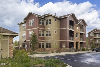 Experience the best of Aspen Meadows in this stunning 2-bedroom on Headwaters Golf Course At Granby Ranch in Colorado - for sale on GolfHomes.com, golf home, golf lot