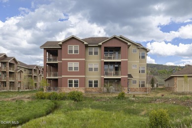 Experience the best of Aspen Meadows in this stunning 2-bedroom on Headwaters Golf Course At Granby Ranch in Colorado - for sale on GolfHomes.com, golf home, golf lot