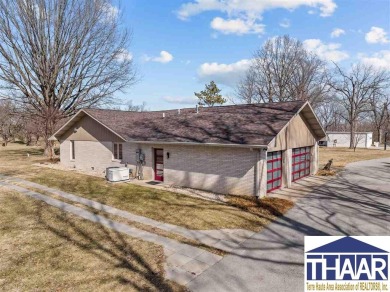 Discover an exceptional, executive property located on hole #14 on Country Club of Terre Haute in Indiana - for sale on GolfHomes.com, golf home, golf lot