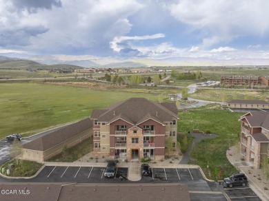 Experience the best of Aspen Meadows in this stunning 2-bedroom on Headwaters Golf Course At Granby Ranch in Colorado - for sale on GolfHomes.com, golf home, golf lot