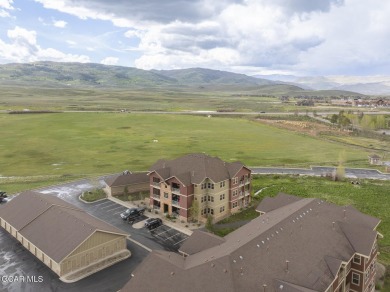 Experience the best of Aspen Meadows in this stunning 2-bedroom on Headwaters Golf Course At Granby Ranch in Colorado - for sale on GolfHomes.com, golf home, golf lot