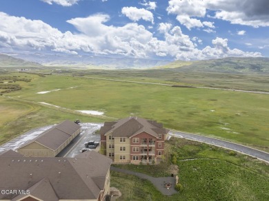 Experience the best of Aspen Meadows in this stunning 2-bedroom on Headwaters Golf Course At Granby Ranch in Colorado - for sale on GolfHomes.com, golf home, golf lot