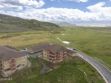 Experience the best of Aspen Meadows in this stunning 2-bedroom on Headwaters Golf Course At Granby Ranch in Colorado - for sale on GolfHomes.com, golf home, golf lot