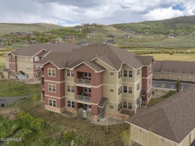 Experience the best of Aspen Meadows in this stunning 2-bedroom on Headwaters Golf Course At Granby Ranch in Colorado - for sale on GolfHomes.com, golf home, golf lot