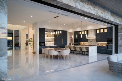 Elevated modern luxury crowns prestigious MacDonald Highlands on Dragon Ridge Country Club in Nevada - for sale on GolfHomes.com, golf home, golf lot