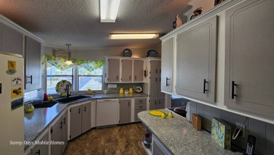 Welcome to 2001 Bayou Drive South located in the sought after on The Riverside Golf Club in Florida - for sale on GolfHomes.com, golf home, golf lot