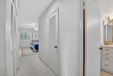 Elegant Country Club Living - Spacious 2-Bedroom + Den with Lake on Hunters Run Golf and Country Club in Florida - for sale on GolfHomes.com, golf home, golf lot