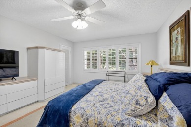 Elegant Country Club Living - Spacious 2-Bedroom + Den with Lake on Hunters Run Golf and Country Club in Florida - for sale on GolfHomes.com, golf home, golf lot