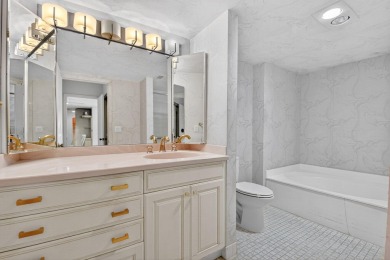 Elegant Country Club Living - Spacious 2-Bedroom + Den with Lake on Hunters Run Golf and Country Club in Florida - for sale on GolfHomes.com, golf home, golf lot