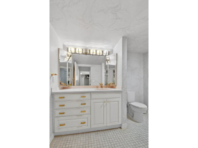 Elegant Country Club Living - Spacious 2-Bedroom + Den with Lake on Hunters Run Golf and Country Club in Florida - for sale on GolfHomes.com, golf home, golf lot