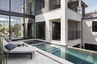 Set within the guard-gated enclave of Big Canyon in Newport on Big Canyon Country Club in California - for sale on GolfHomes.com, golf home, golf lot