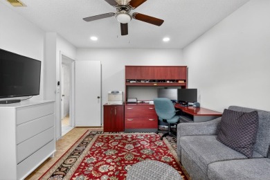 Elegant Country Club Living - Spacious 2-Bedroom + Den with Lake on Hunters Run Golf and Country Club in Florida - for sale on GolfHomes.com, golf home, golf lot