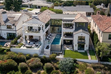 Set within the guard-gated enclave of Big Canyon in Newport on Big Canyon Country Club in California - for sale on GolfHomes.com, golf home, golf lot