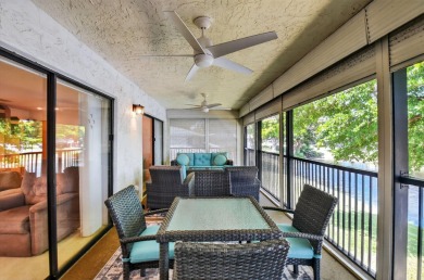Elegant Country Club Living - Spacious 2-Bedroom + Den with Lake on Hunters Run Golf and Country Club in Florida - for sale on GolfHomes.com, golf home, golf lot
