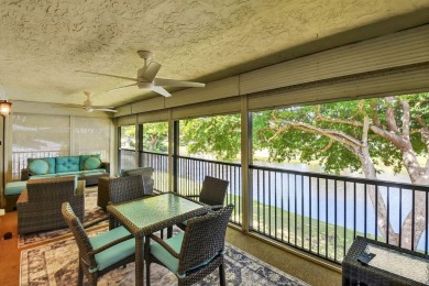 Elegant Country Club Living - Spacious 2-Bedroom + Den with Lake on Hunters Run Golf and Country Club in Florida - for sale on GolfHomes.com, golf home, golf lot