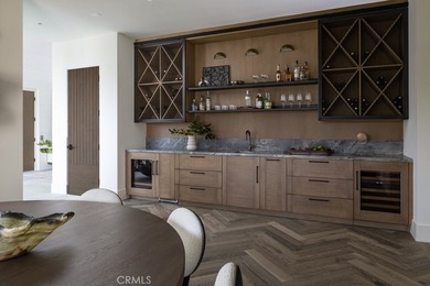 Set within the guard-gated enclave of Big Canyon in Newport on Big Canyon Country Club in California - for sale on GolfHomes.com, golf home, golf lot