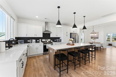 Beautifully maintained 3-bedroom, 2.5-bath home built in 2024 on Edgewater Golf Club in South Carolina - for sale on GolfHomes.com, golf home, golf lot